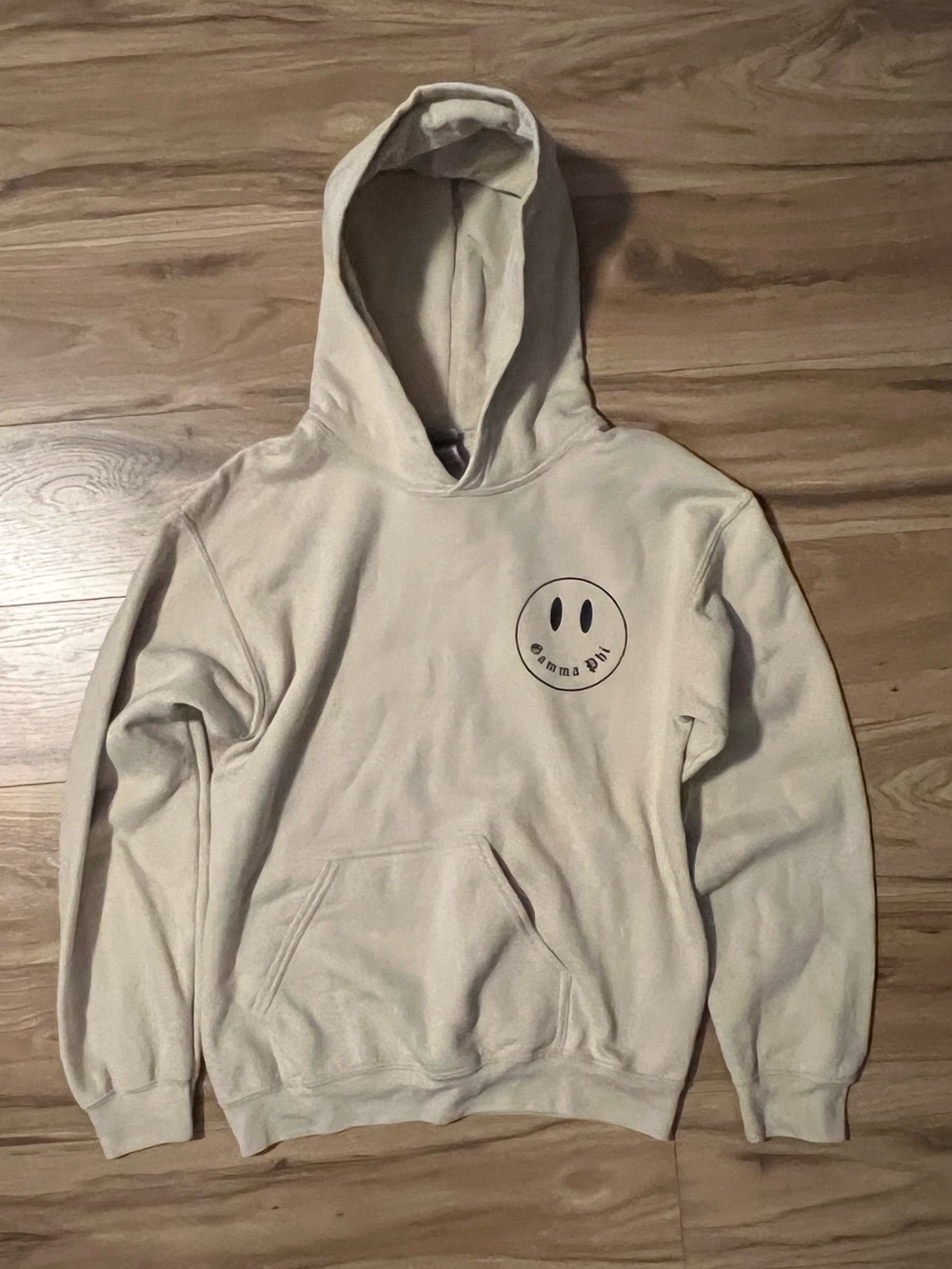 Gamma Phi Gildan Cream Hoodie with Black Smiley Graphic Small
